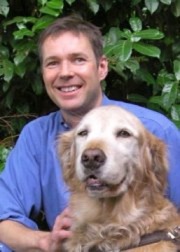 Photo of Collin van Uchelen with his guide dog Houdini